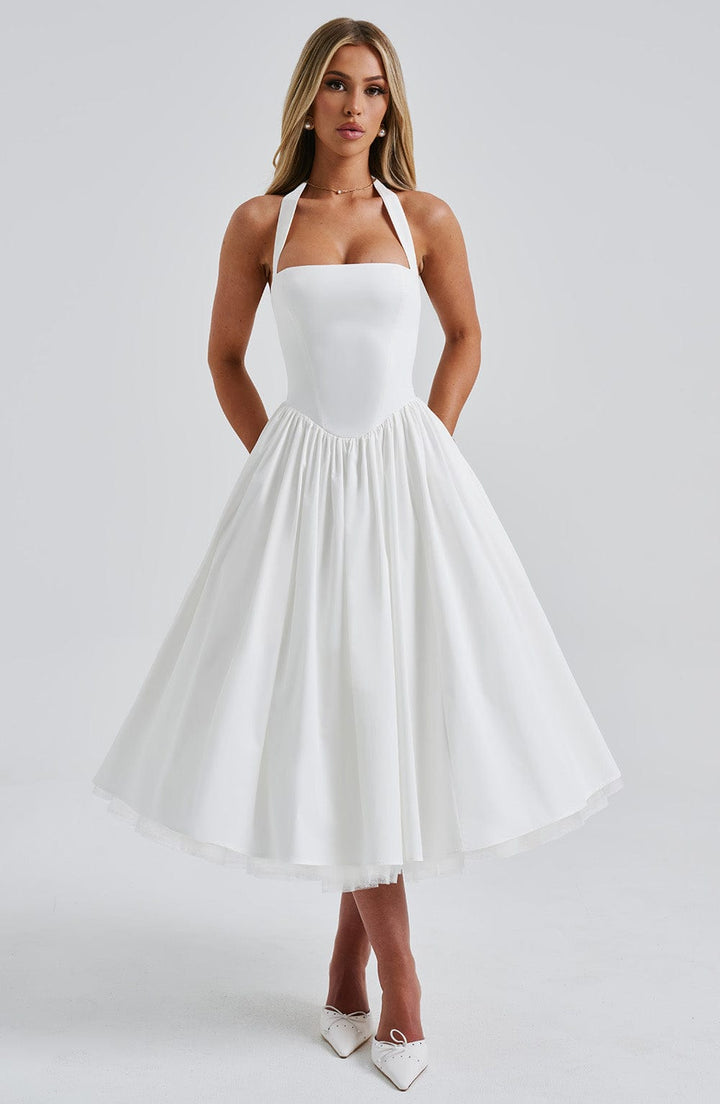 Black elegant women's midi dress. Halter neck design for formal events & special occasions.