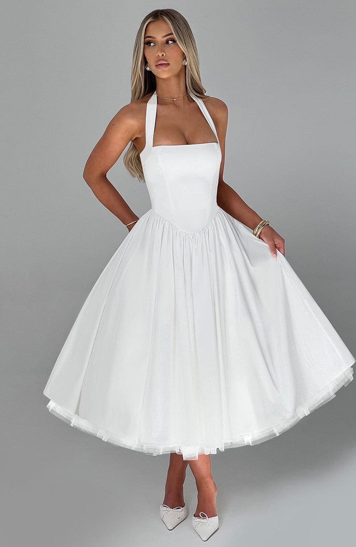 Chic special occasion halter midi dress. Perfect for wedding guests & formal events.