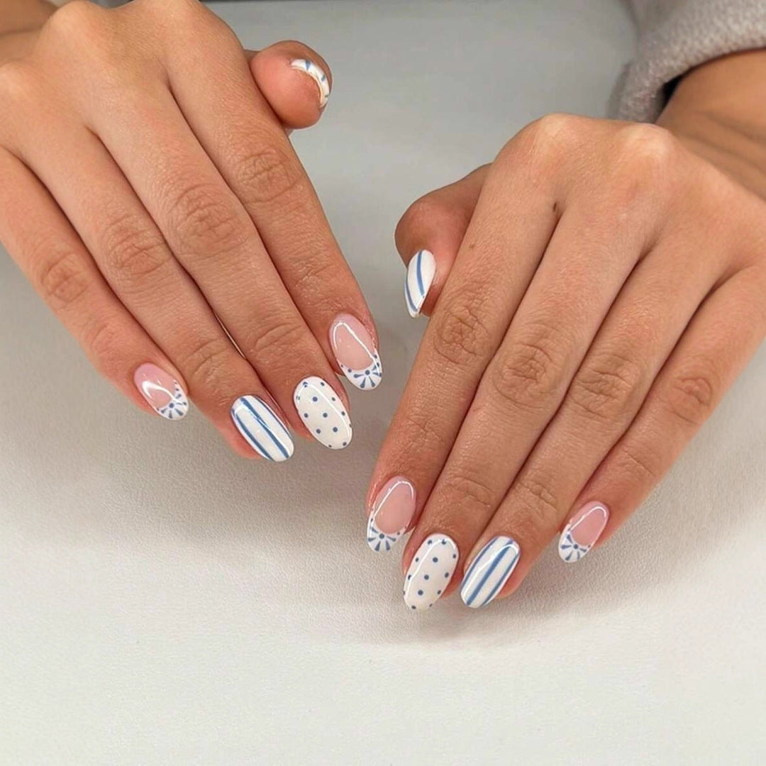 Decorative blue nail art stickers for women, creating a chic and beautiful manicure design.