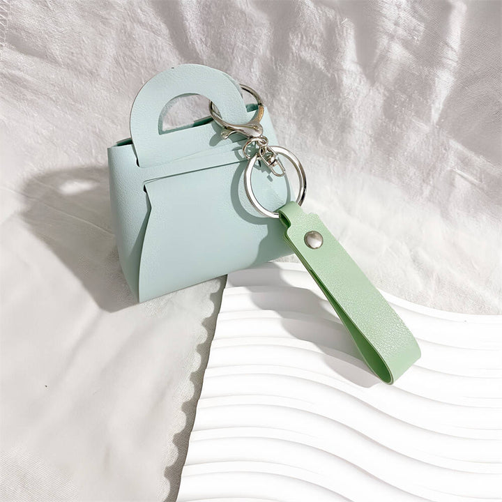 Fashionable handbag keychain. Versatile faux leather bag charm & key accessory for women.