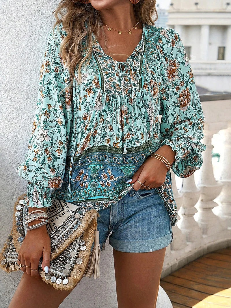 Women's casual chic floral blouse, vibrant print short sleeve top for comfortable summer style.