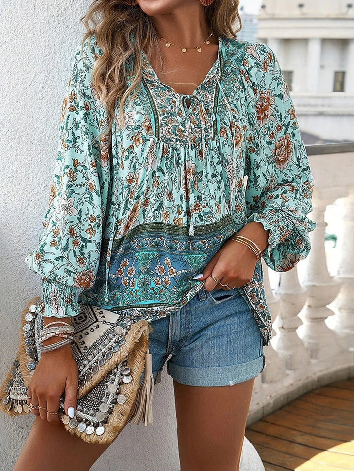 Women's casual chic floral blouse, vibrant print short sleeve top for comfortable summer style.