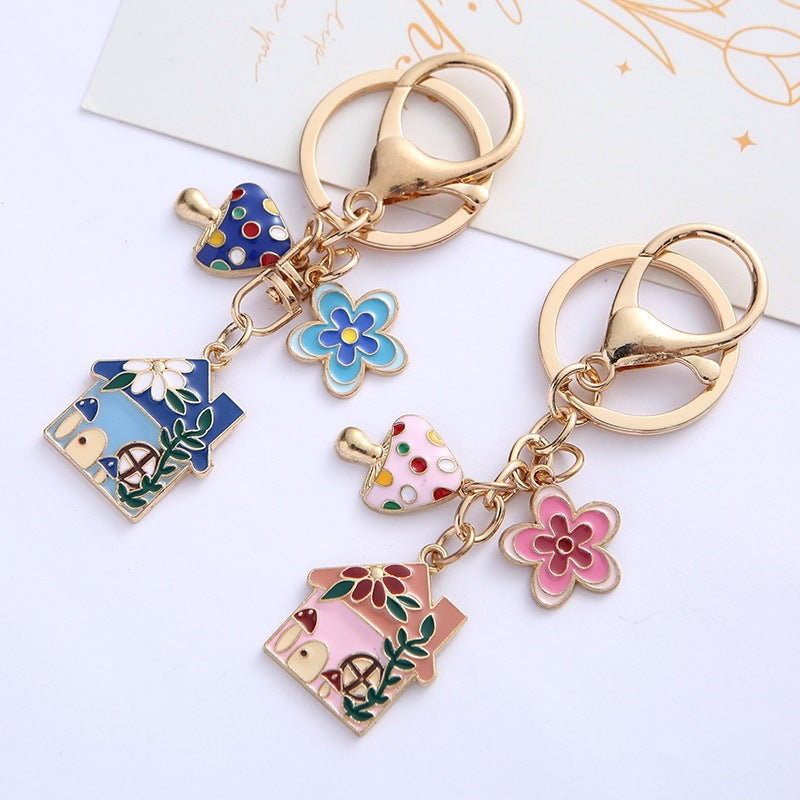 Vibrant enamel floral house charm keychain, a stylish keyring and bag accessory for women.