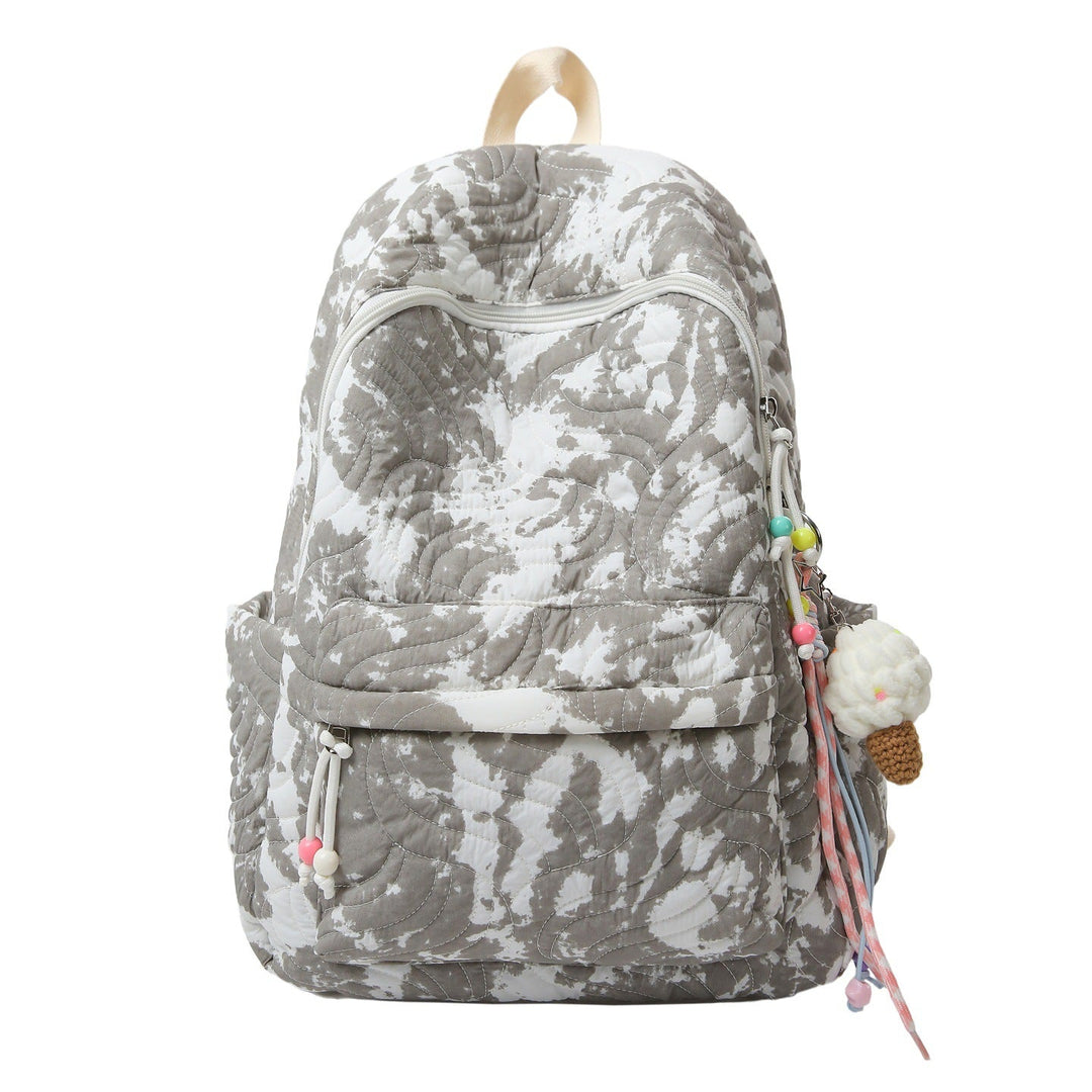 Stylish white quilted backpack for women, perfect as a fashion accessory, travel bag, or daily carry.