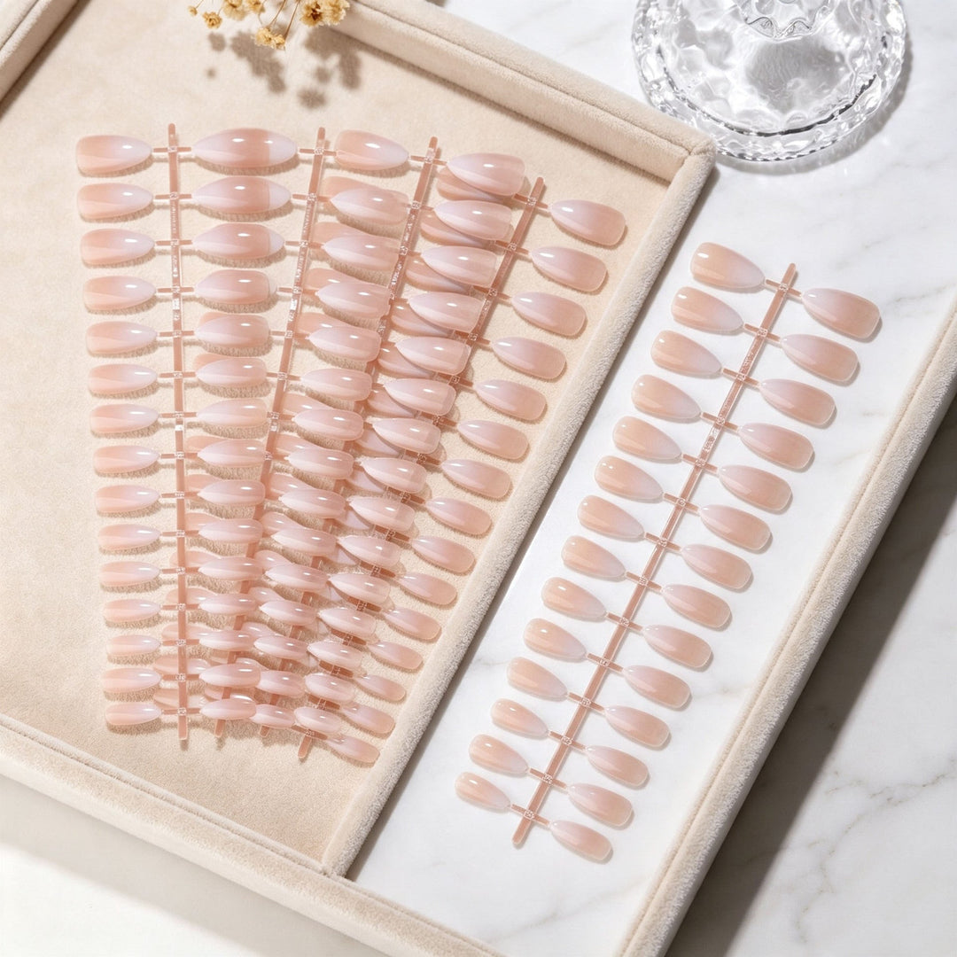Elegant nude & pink fake nails for women, ideal for a quick DIY manicure or special occasion, long-lasting wear.