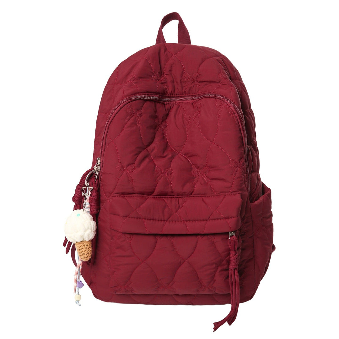 Elegant women's quilted backpack, spacious and durable for daily use, travel, or a chic school bag.