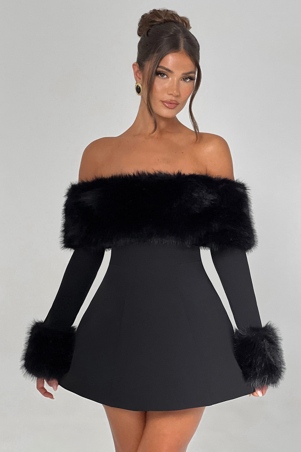 Chic red off-shoulder dress with plush accents, perfect for a glamorous night out.