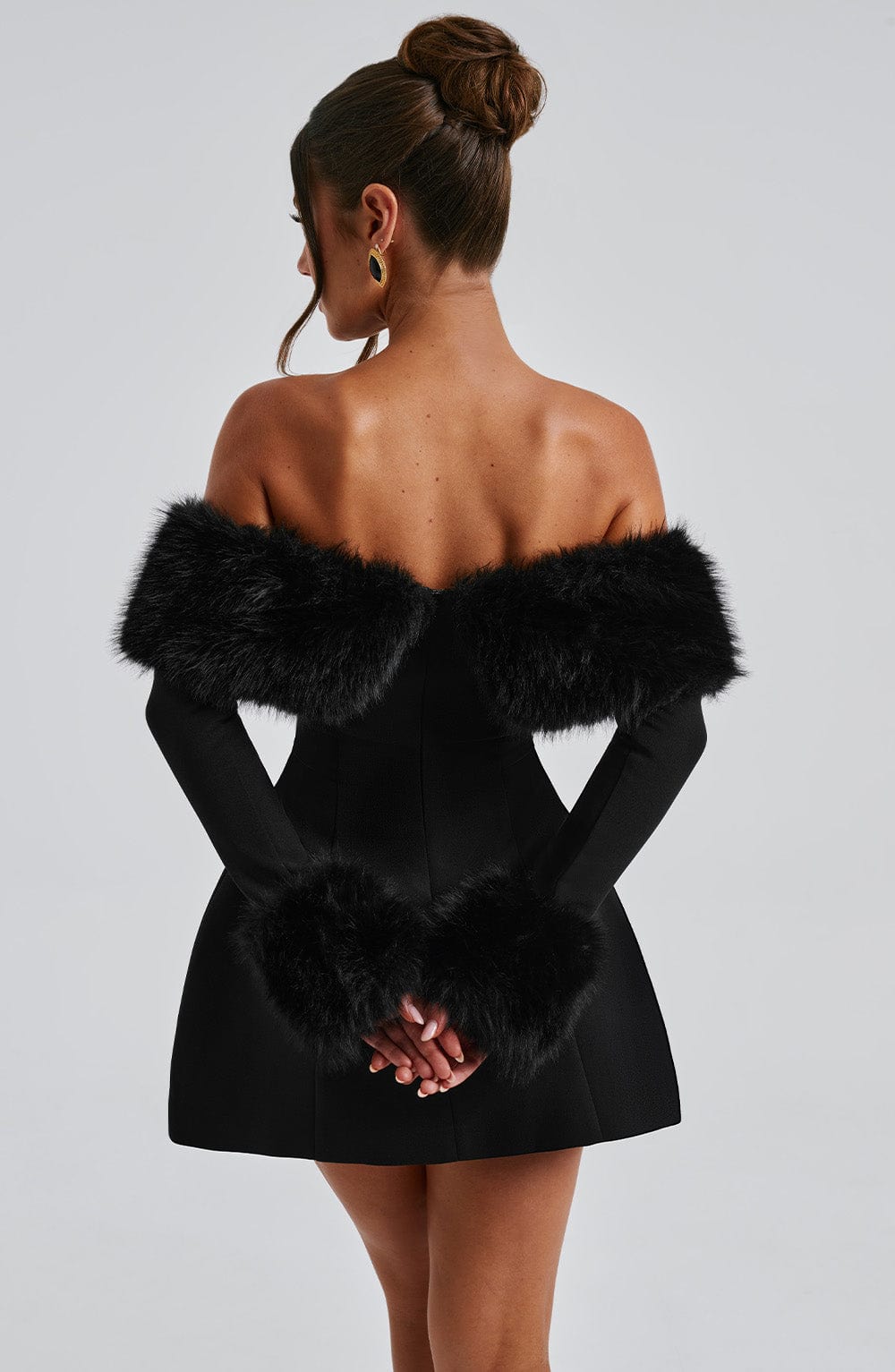 Flared red off-shoulder evening gown with plush accents, ideal for parties and events.