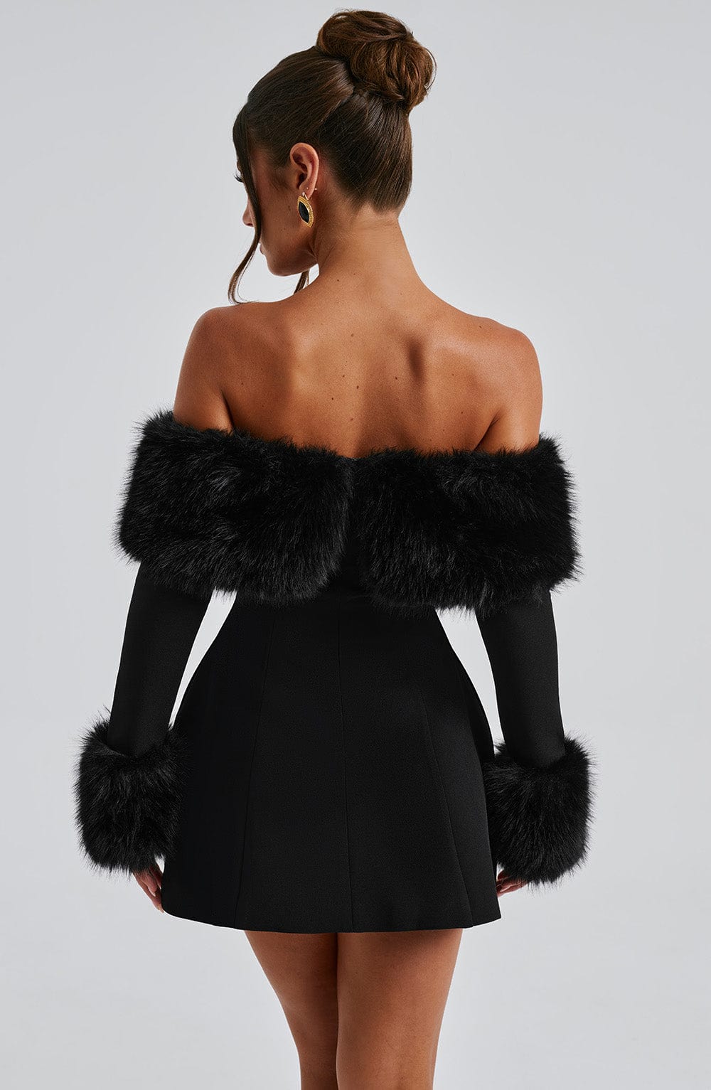 Glamorous red off-shoulder cocktail dress, featuring plush accents and a beautiful flare.