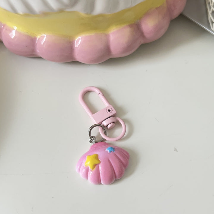Vibrant star bag charm, a fashionable keyring for keys & purses. Unique and eye-catching design.