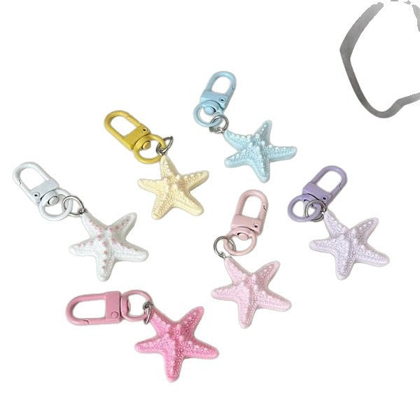 Eye-catching star keyring, a perfect gift idea for any bag or set of keys. Unique design accessory.