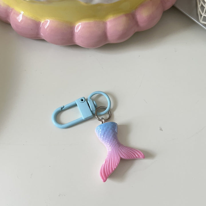 Modern star keyring, a versatile bag charm and fashion accessory. Perfect for personalizing your items.
