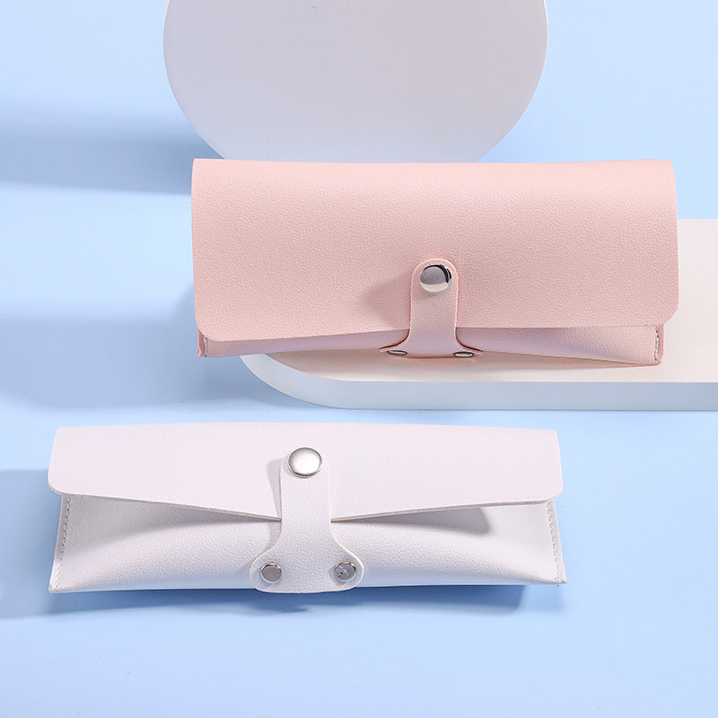 Chic unisex eyewear storage case for glasses & sunglasses, perfect for travel & protection.