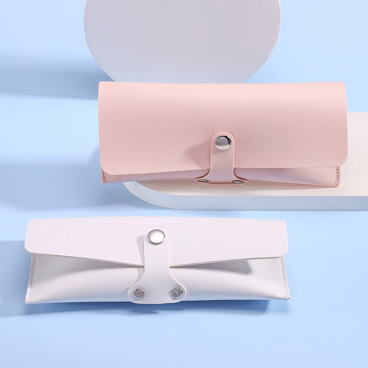 Chic unisex eyewear storage case for glasses & sunglasses, perfect for travel & protection.