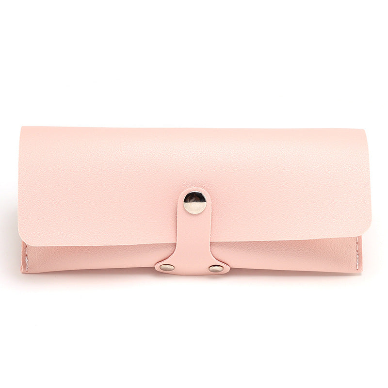 Compact travel case for glasses & sunglasses, a stylish and portable eyewear organizer.