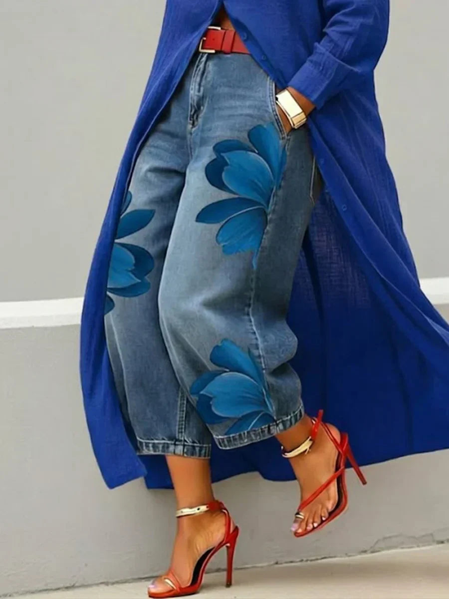Trendy women's two-piece outfit featuring a long-sleeve shirt dress and comfortable floral print jeans.