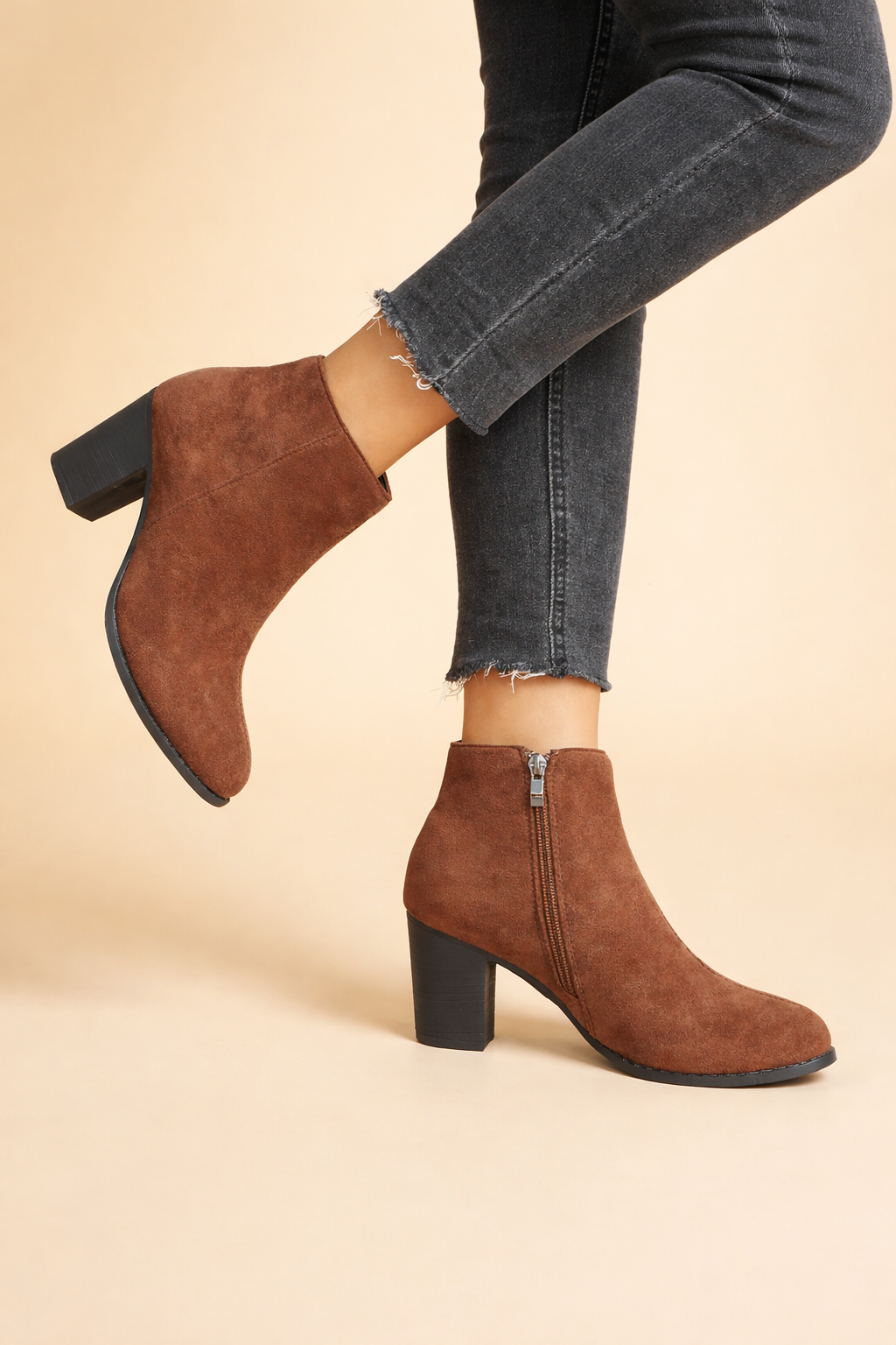 Chic women's ankle boots with a comfortable block heel & convenient side zip. Perfect for everyday fall & winter style.