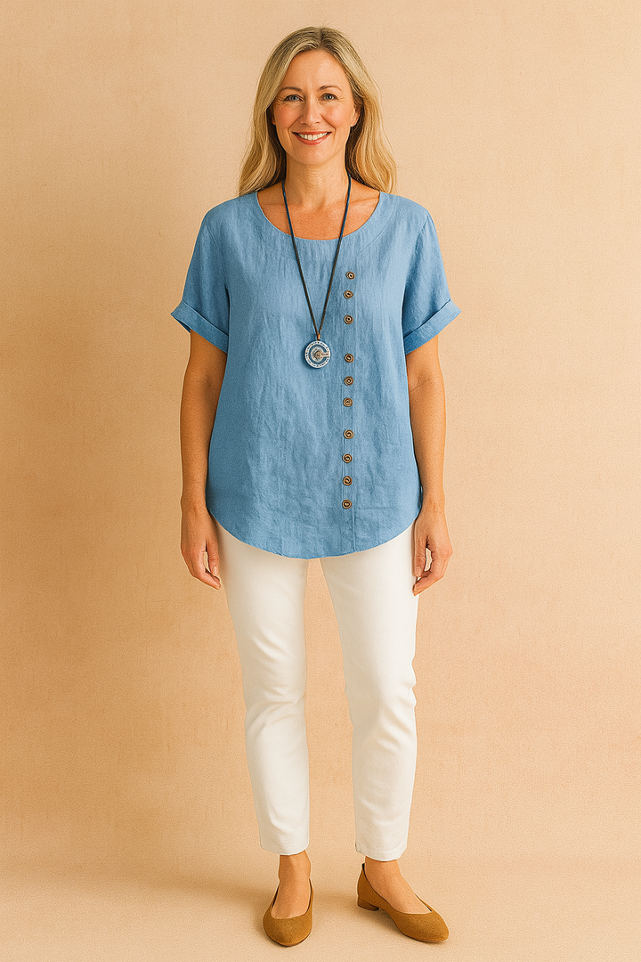 Modern women's asymmetrical short sleeve blouse, a chic everyday top with unique clasp.
