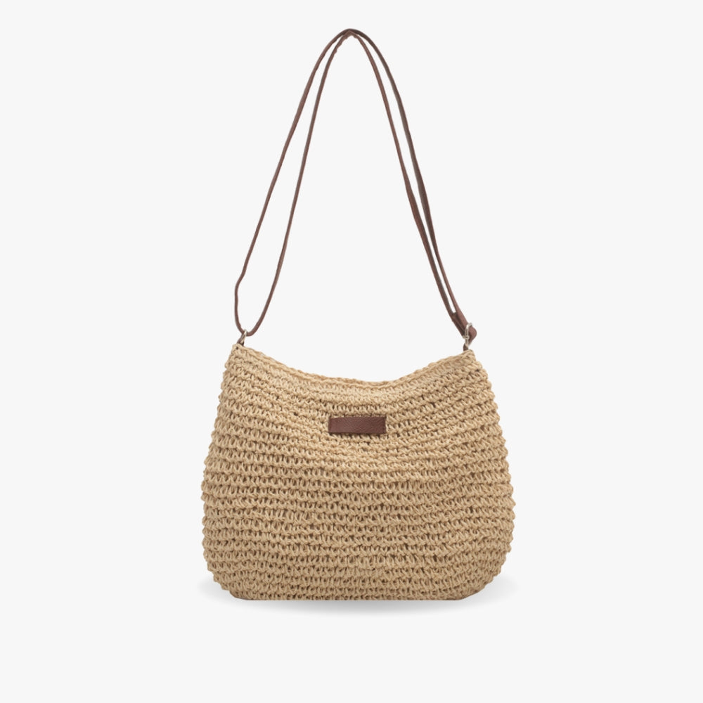 Chic women's beige shoulder crossbody bag, structured & versatile for casual or summer outfits. Perfect handbag.