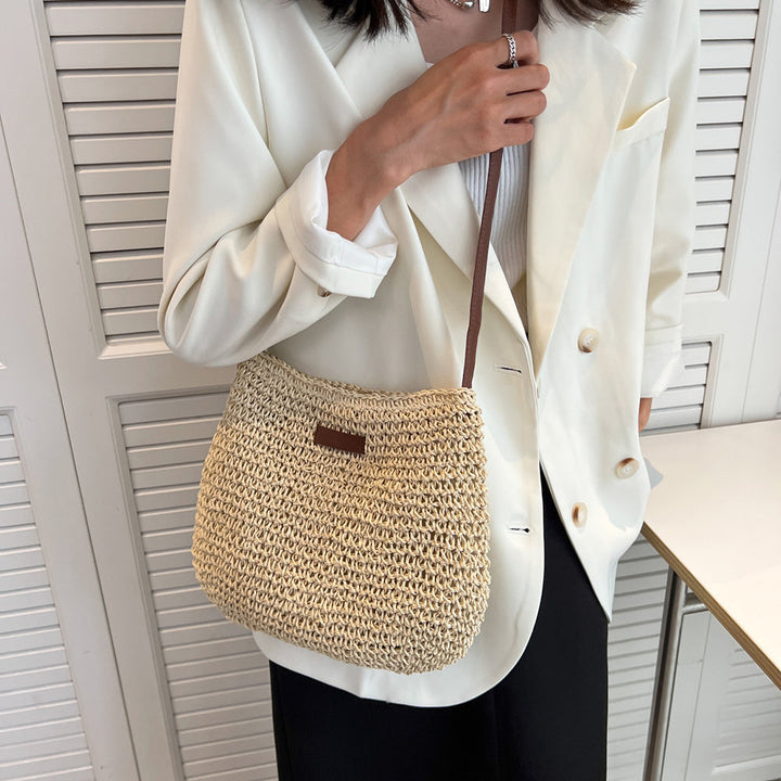 Stylish women's brown shoulder bag, converts to crossbody. Versatile handbag for casual, daily, or summer elegance.
