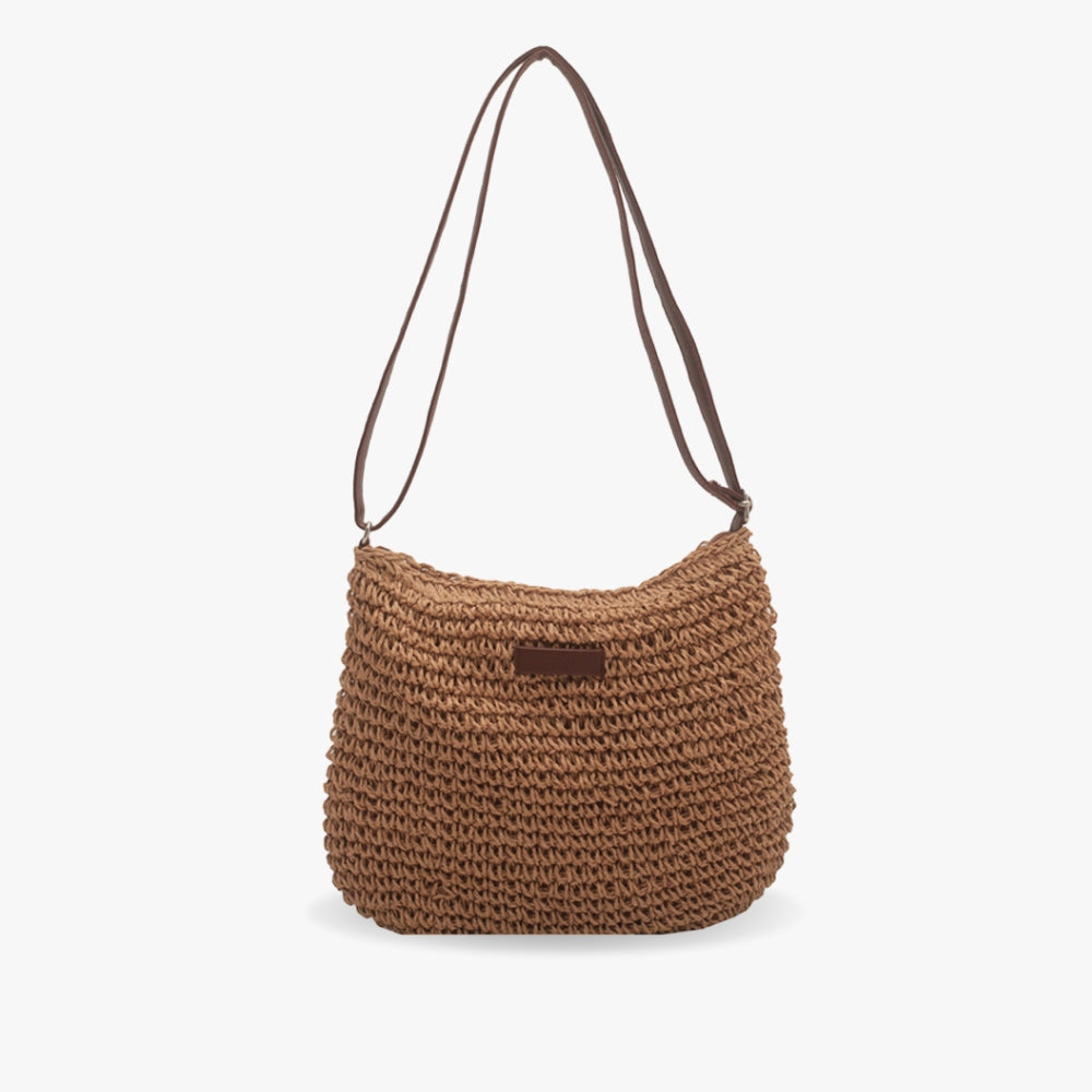 Modern chic women's brown shoulder bag, easily transforms to a crossbody. A versatile, stylish handbag for any occasion.