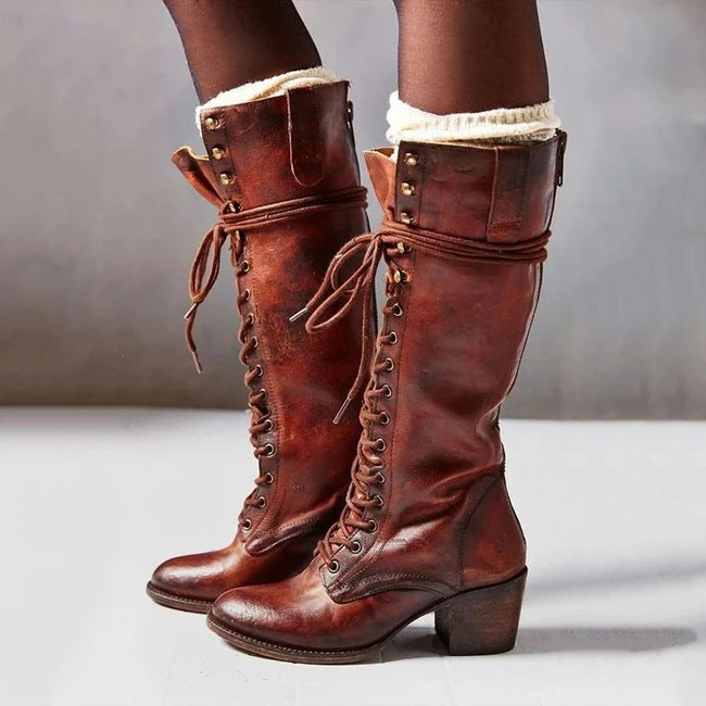 Chic women's black lace-up knee boots, perfect for fall and winter everyday style. Stylish and comfortable tall footwear.