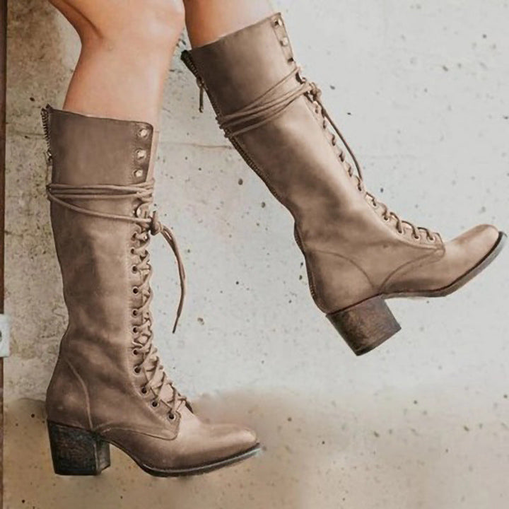 Women's chic lace-up knee boots in black, designed for stylish and comfortable everyday wear. Perfect fall & winter footwear.