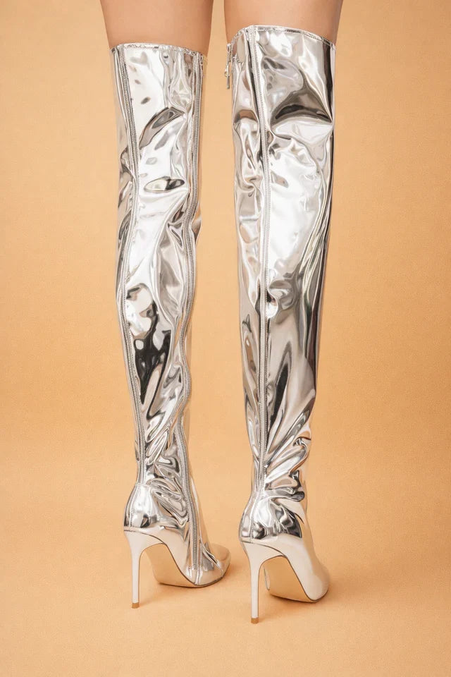 Elegant women's over-the-knee fashion boots with pointed toe, sleek design & practical zipper for a chic look.