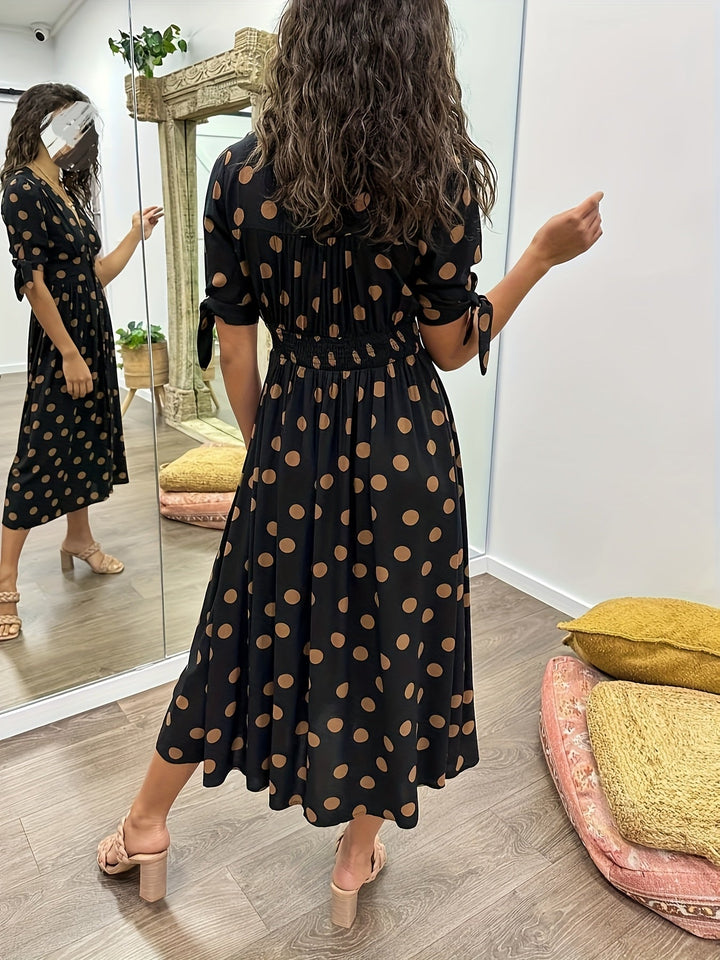 Versatile black polka dot midi dress for women, perfect for elegant parties, casual outings, or sophisticated wear.