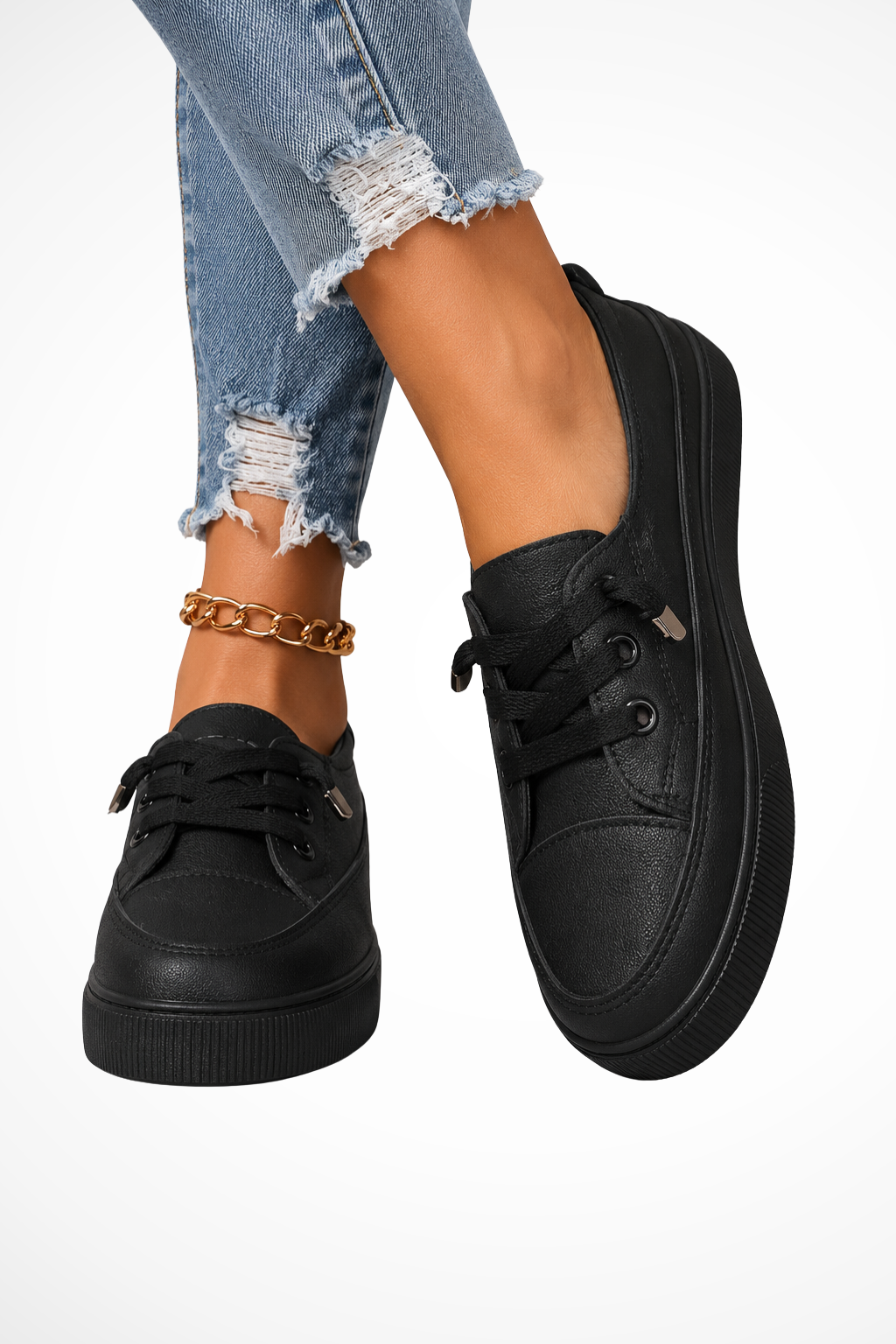 Chic women's black slip-on sneakers for comfortable everyday wear. Easy casual style.