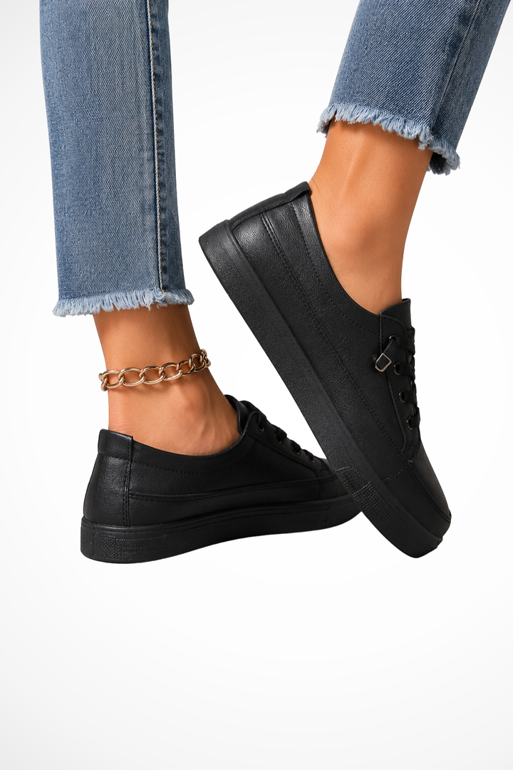 Chic women's white casual slip-on sneakers, providing comfort and versatile everyday style.