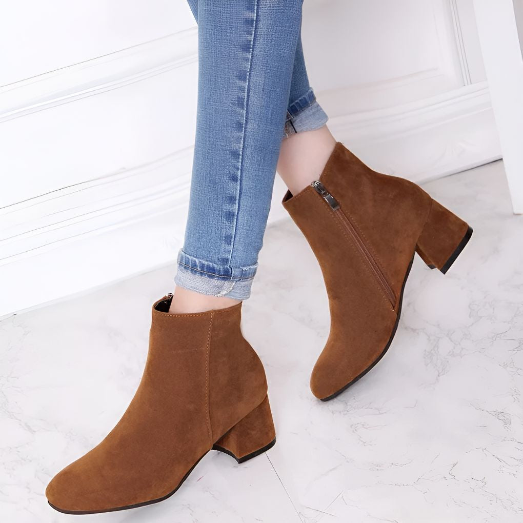 Chic women's block heel ankle boots with pointed toes. Stylish & comfortable for fall/winter fashion.