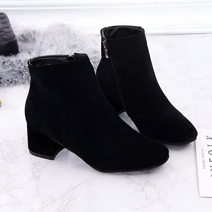 Comfortable women's chic ankle boots. Designed with a trendy block heel & sleek pointed toe for modern looks.