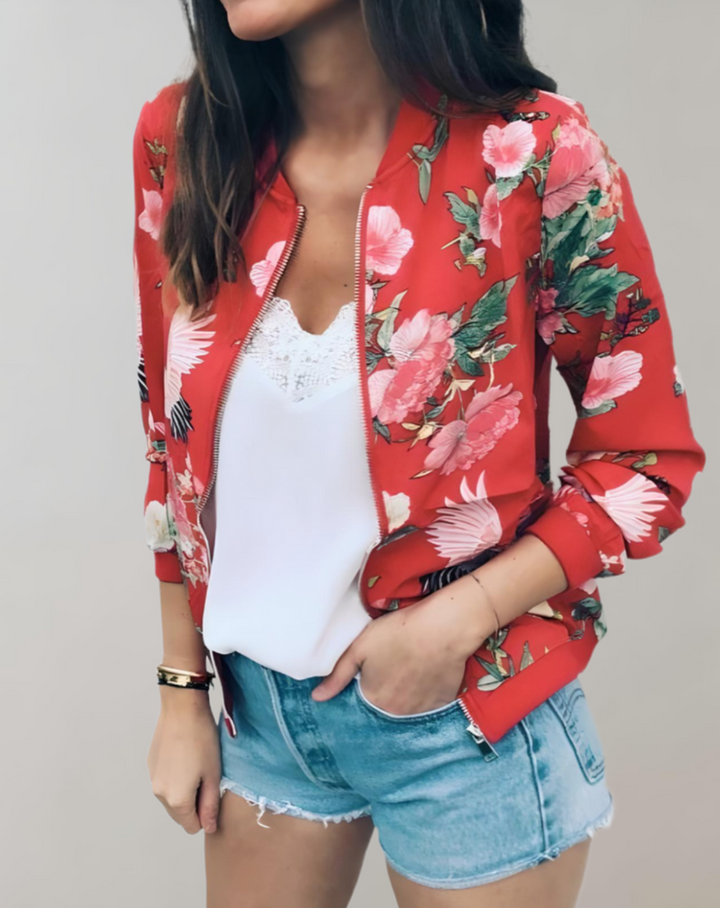 Trendy women's floral bomber jacket. Stylish fashion outerwear, perfect for a chic ladies spring look.