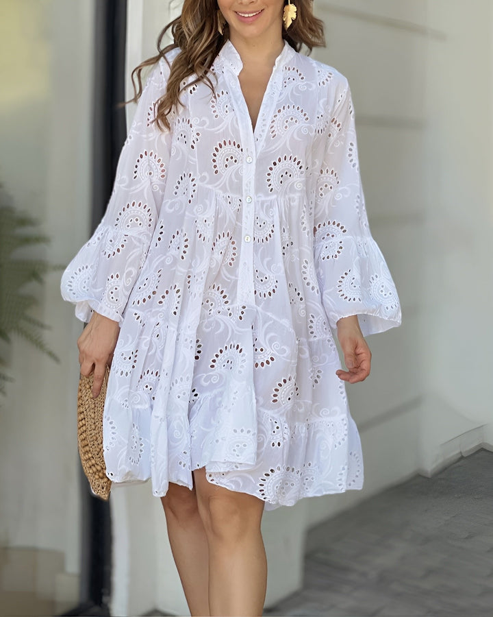 Chic women's Broderie Anglaise tiered mini shirt dress with long sleeves, button front, perfect for summer fashion.