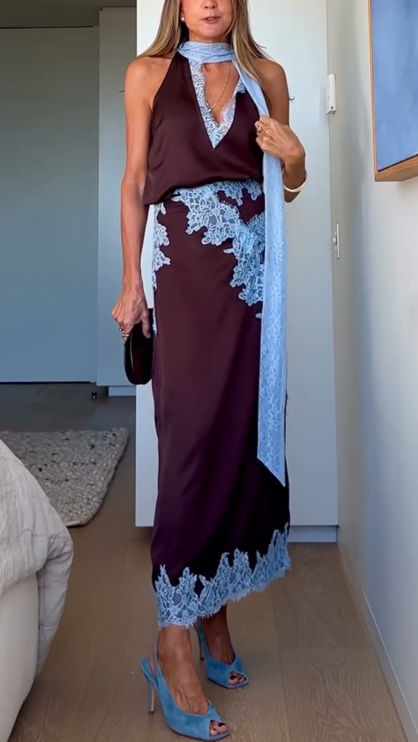 Brown coordinated women's two-piece set: a chic halter top & elegant maxi skirt for versatile styling.