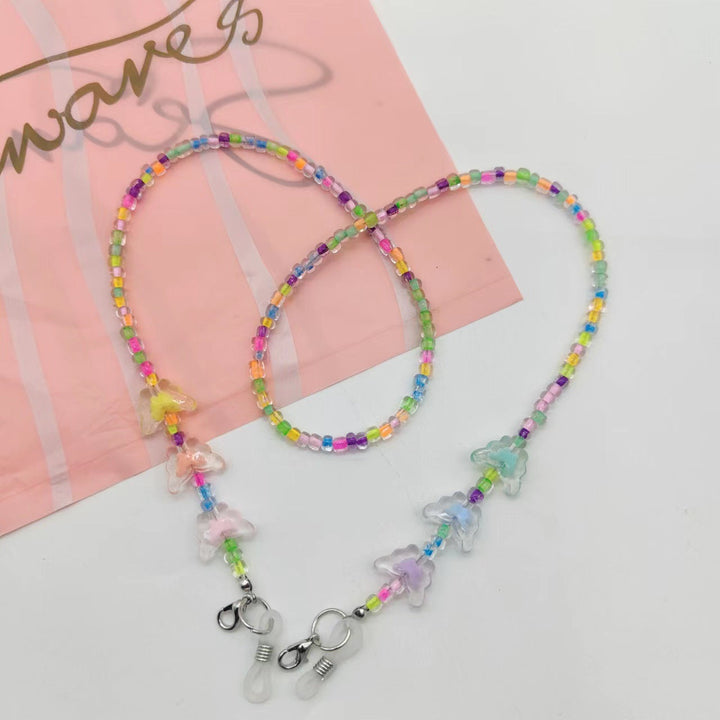 Chic women's butterfly glasses chain. Stylish eyewear holder accessory, secure and convenient for daily use.