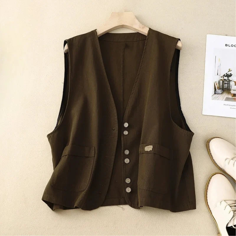 Effortlessly chic women's vest with button-front & pockets. A relaxed fit sleeveless top perfect for summer casual wear.