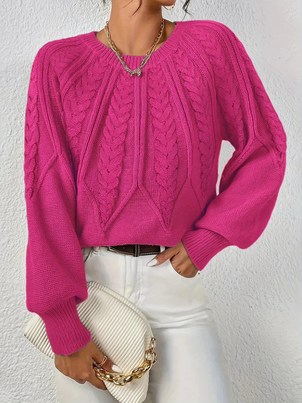 Fashionable women's cable textured sweater, a warm and cozy long sleeve pullover with eye-catching voluminous cuffs.