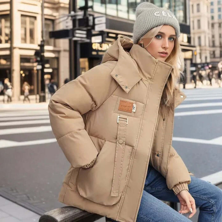 Chic women's casual winter jacket, hip-length, perfect for staying warm and stylish in cold weather.