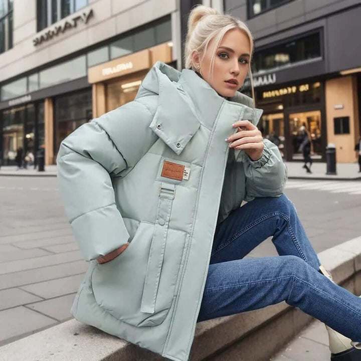 Warm & stylish women's hip-length winter jacket, perfect chic casual outerwear for cold weather fashion.