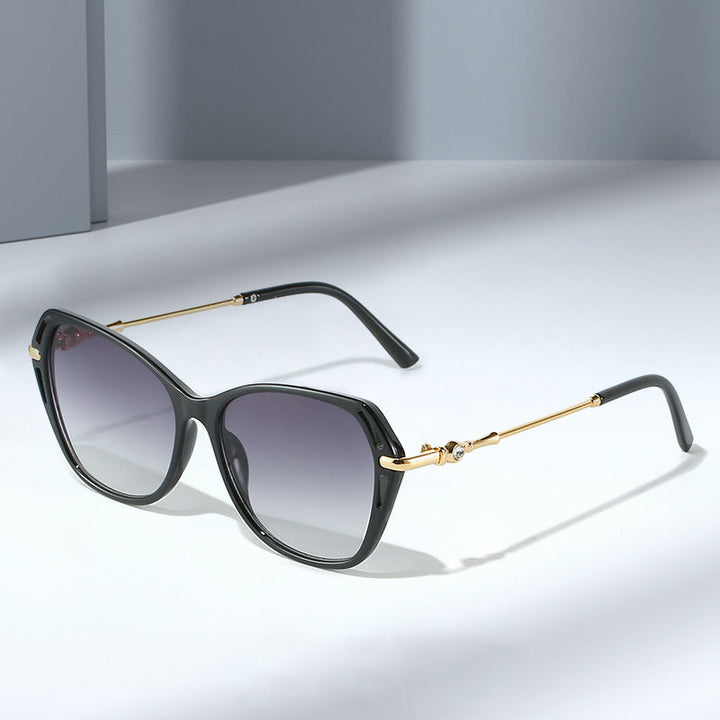Chic women's cat-eye sunglasses, elegant UV protective eyewear for sophisticated summer style.