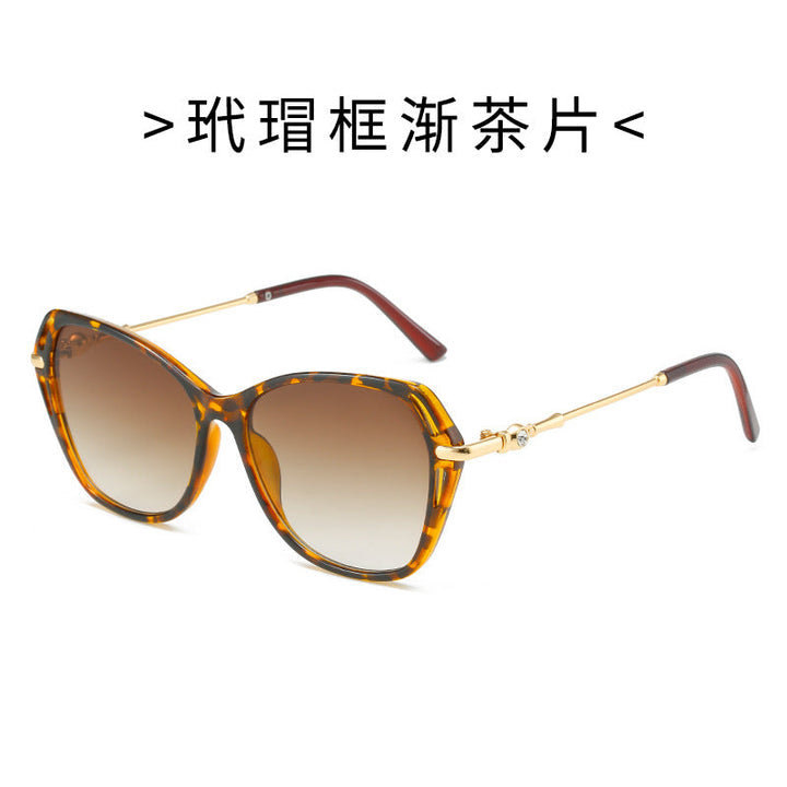 Women's designer cat-eye sunglasses, combining elegance with superior UV eye protection for sunny days.