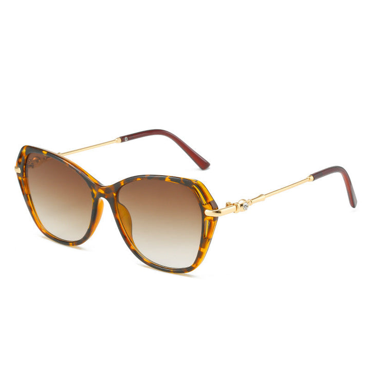 Elegant women's cat-eye eyewear, perfect fashion accessory with full UV protection for sunny days.