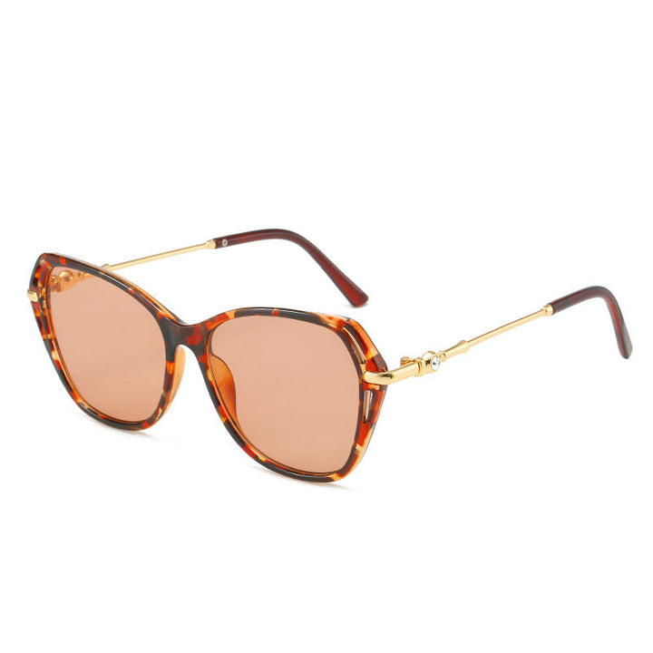 Modern cat-eye sunglasses, a chic accessory for women ensuring stylish eye protection from UV rays.