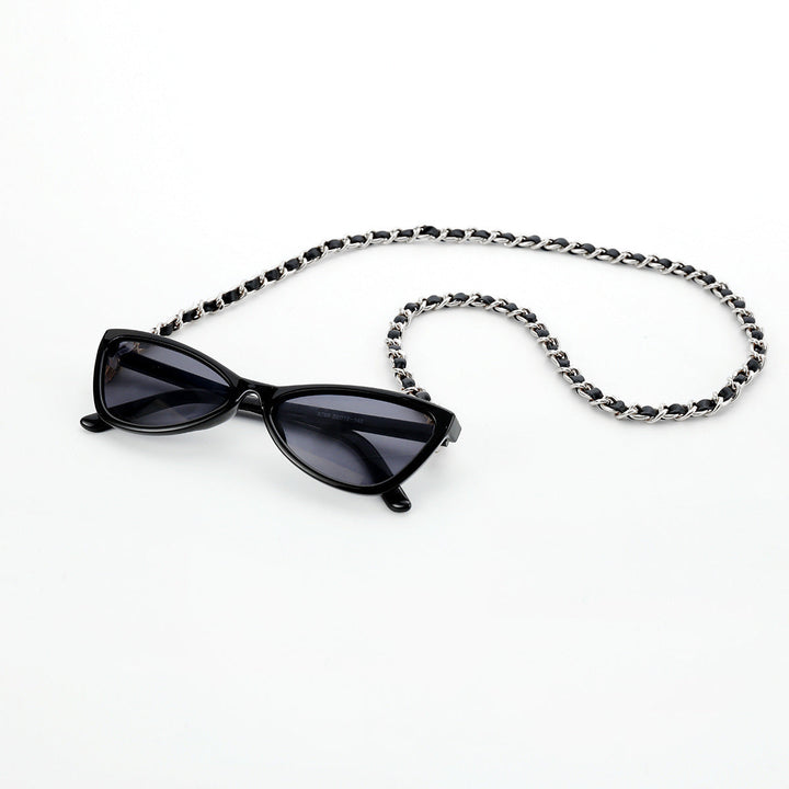 Retro women's cat-eye sunglasses with secure chain strap, perfect for a chic, vintage summer look.