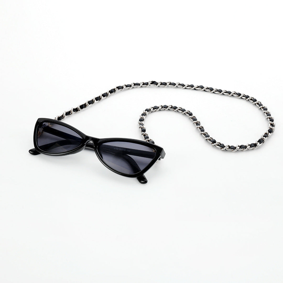 Stylish women's cat-eye sunglasses with chain strap; offers UV protection and a chic, lightweight feel.