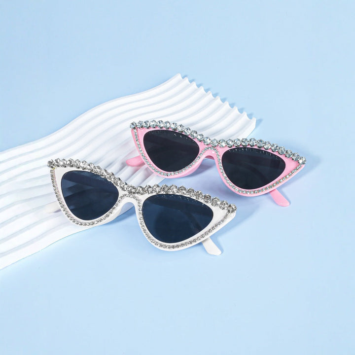 Glamorous women's cat-eye shades with rhinestones, perfect for summer fashion & eye protection.