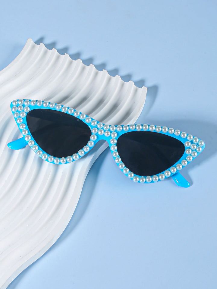 Women's chic cat-eye sunglasses with rhinestone detailing, trendy and offering UV protection.