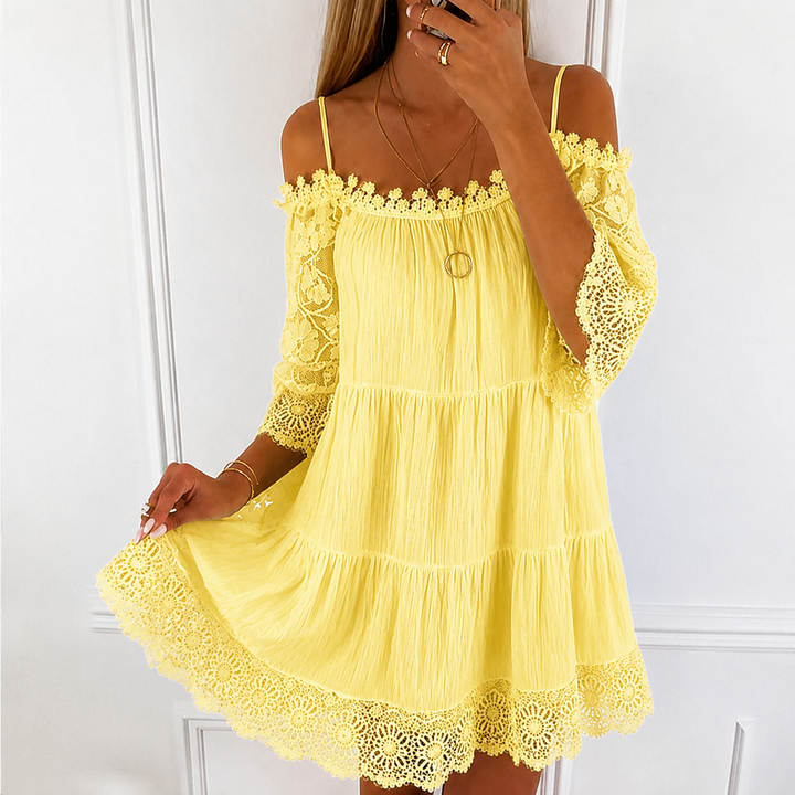Chic women's cold shoulder mini summer dress. Perfect for casual wear, parties, or resort vacations.